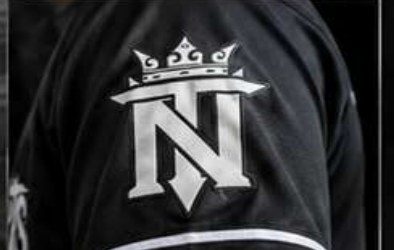 Embroidered crowned TN logo on a black custom jersey Embroidered crowned TN logo on a black custom jersey