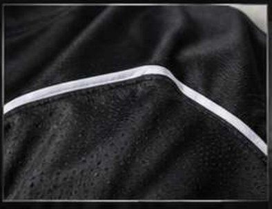 Reinforced flatlock stitching detail on a custom jersey Reinforced flatlock stitching detail on a custom jersey